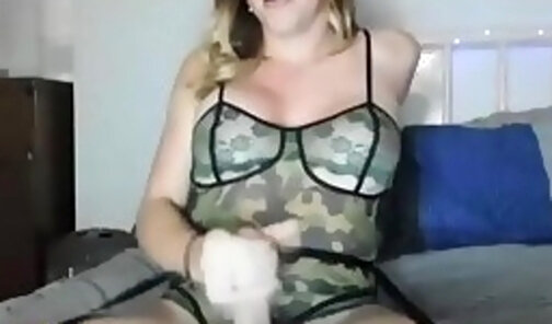 Blonde tranny masturbating her dick in bed