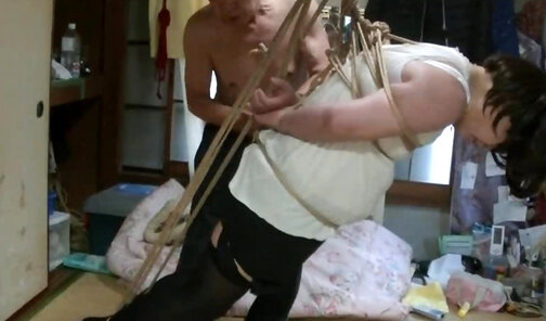Jyosouko Fujikos BDSM rope and candle
