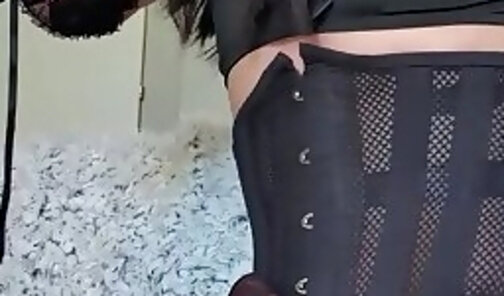 Crossdresser in black lingerie and pantyhose