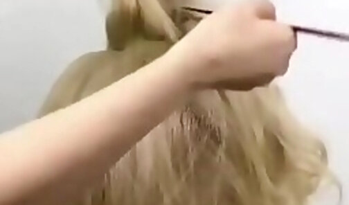 Blond Tranny hairstyle at salon