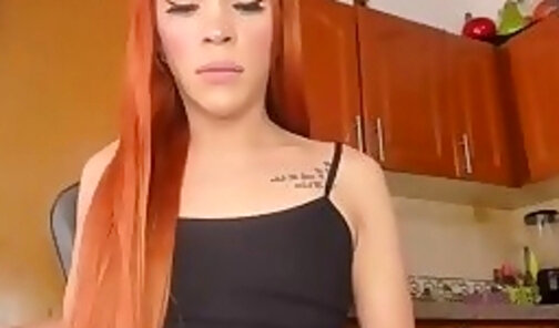 redhead transgirl from Venezuela jerks off her big cock online