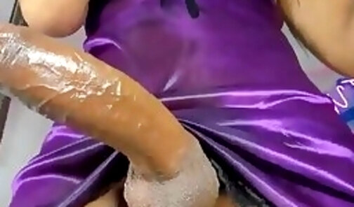 slim latina tranny in purple lingerie jerks off her huge wet cock on webcam