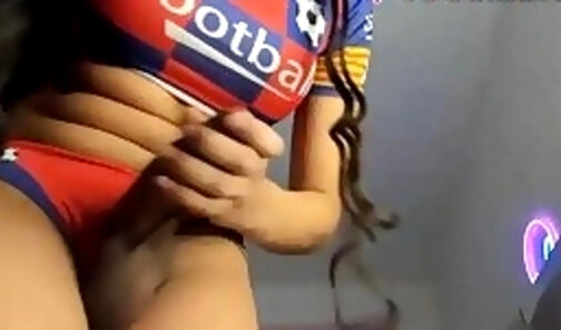 Cheerful Trannie in Football uniform playing with her Lil' Buddy doing a Cam Show