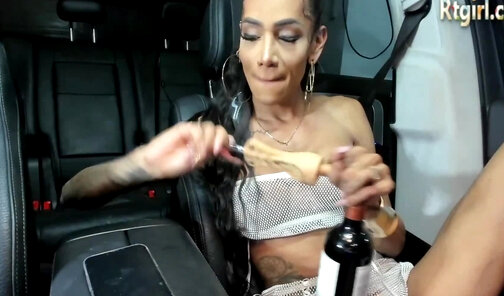 thin shemale with tattoos and big boobs teases in the car
