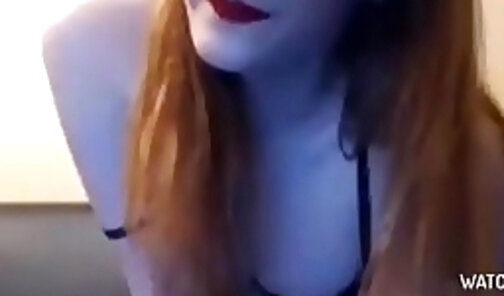 Redhead tgirl strips and tease on cam