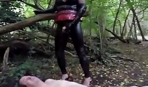 Pissing on slave outdoor in public