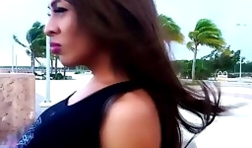 Hardbody Latina trans TaniaQ flashing her firm tits on the boardwalk
