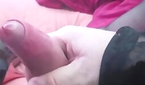 stroking my cock on the bed